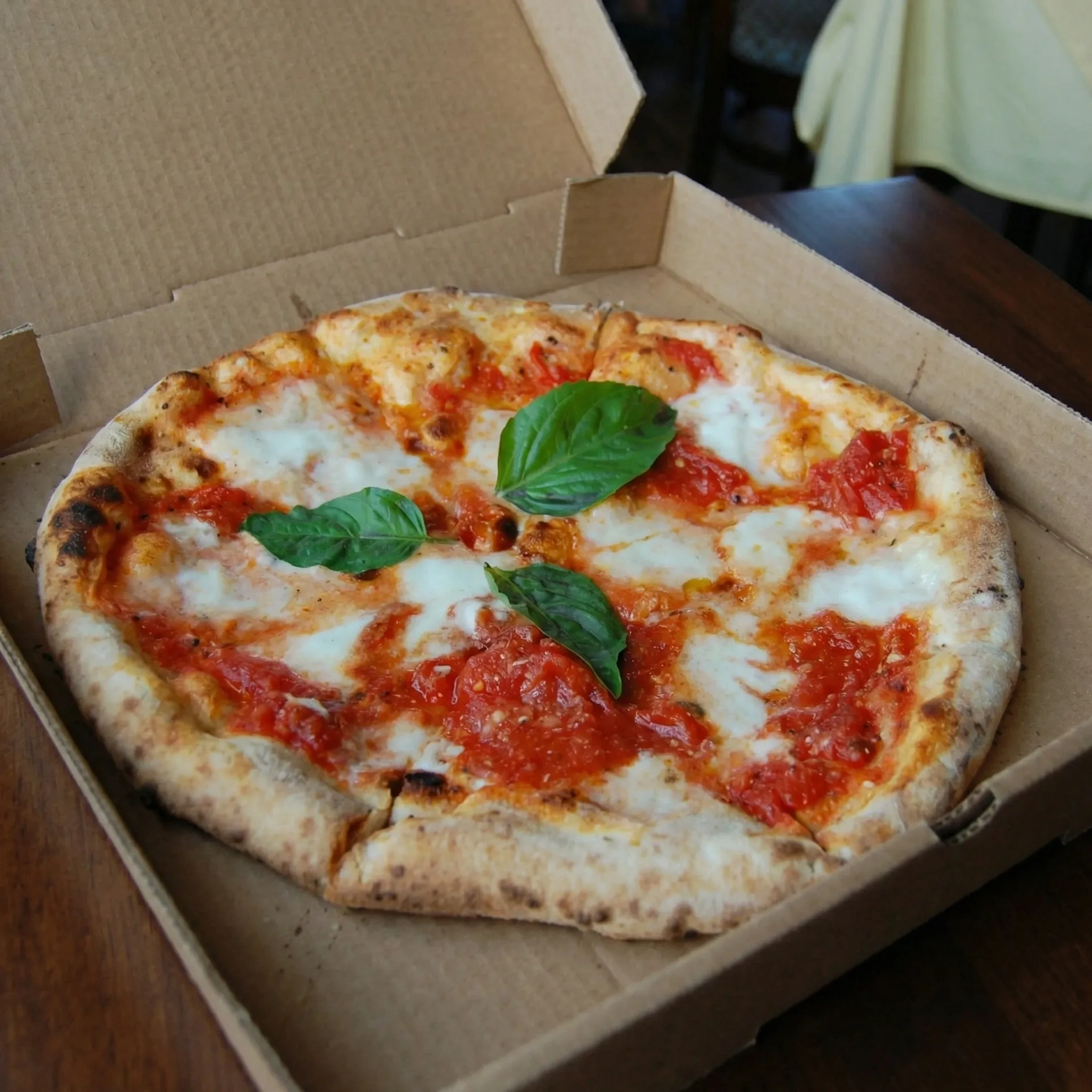 Signature stone oven pizza at 8 Stone Pizza in Mill Woods Edmonton